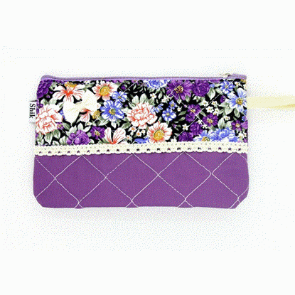 تصویر  کیف لوازم آرایش گلدار