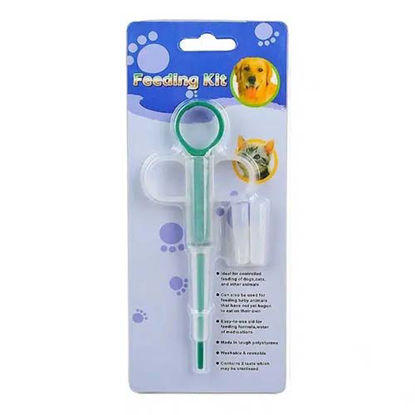 تصویر  قرص و شربت خوران سگ و گربه سبز